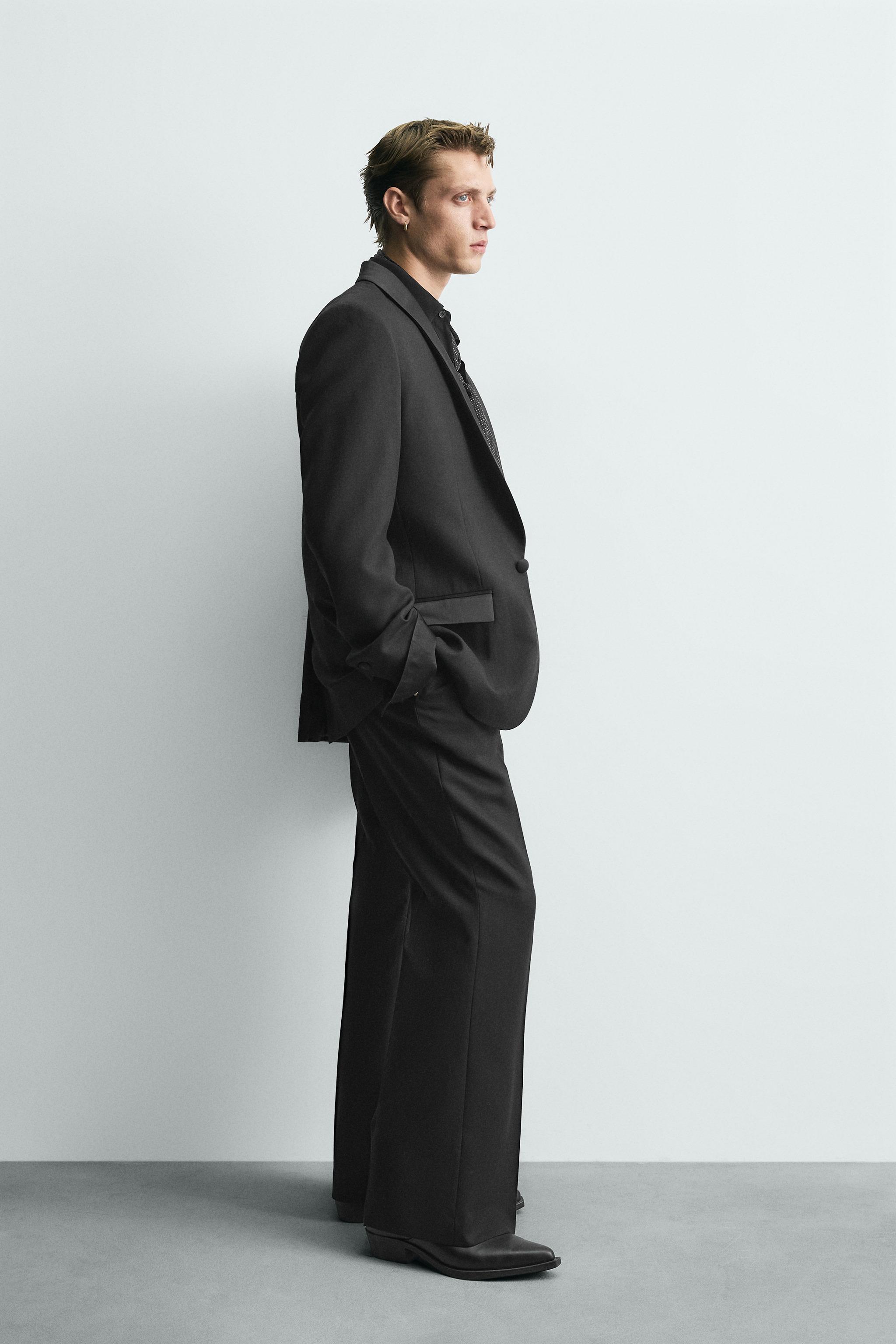 LIMITED EDITION WOOL FLARE FIT SUIT PANTS